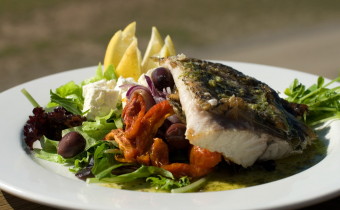 Grilled,Barramundi,,Served,With,A,Greek style,Salad