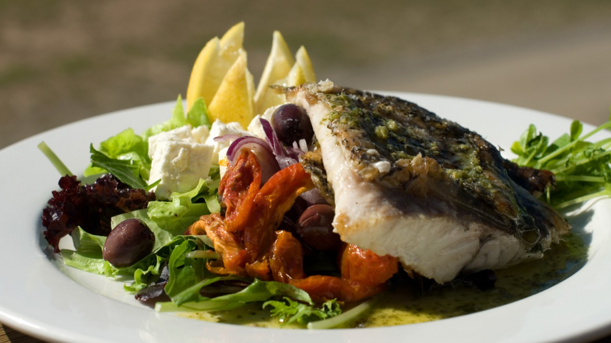 Grilled,Barramundi,,Served,With,A,Greek style,Salad