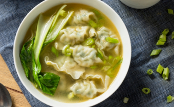 Chicken wonton soup with Asian greens