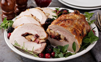 Rolled pork roast with apple & cranberry stuffing