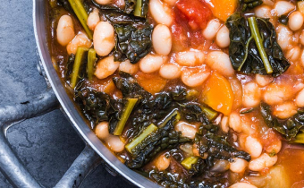 Soup with vegetables, beans, kale, top view.Typical tuscan soup, ribollita.