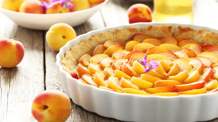 Apricot pie on grey wooden background
