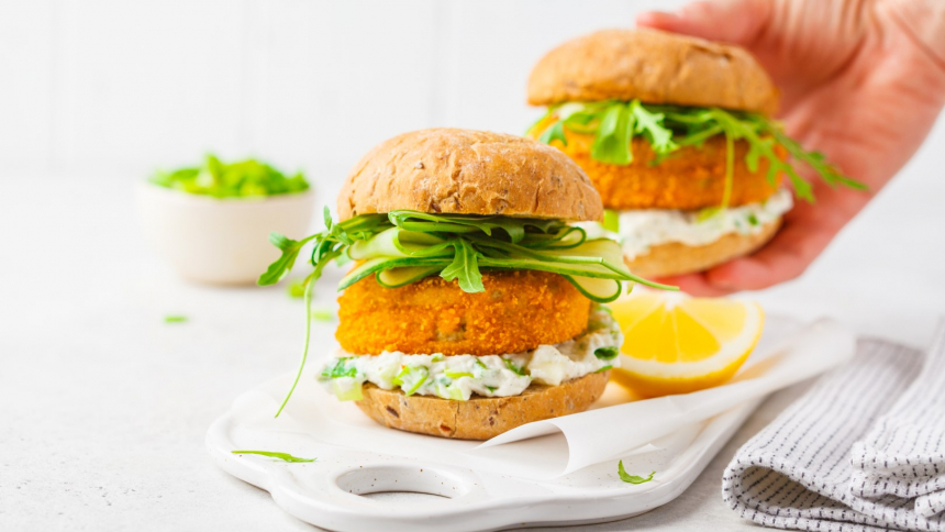 Fish,Burger,With,Cucumber,,Arugula,And,Mayonnaise,Sauce,,White,Background,