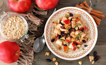 Autumn,Breakfast,Oatmeal,With,Apples,,Cranberries,,Seed,And,Nuts,,Overhead