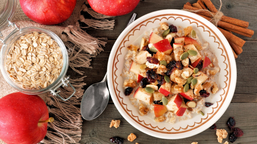 Autumn,Breakfast,Oatmeal,With,Apples,,Cranberries,,Seed,And,Nuts,,Overhead