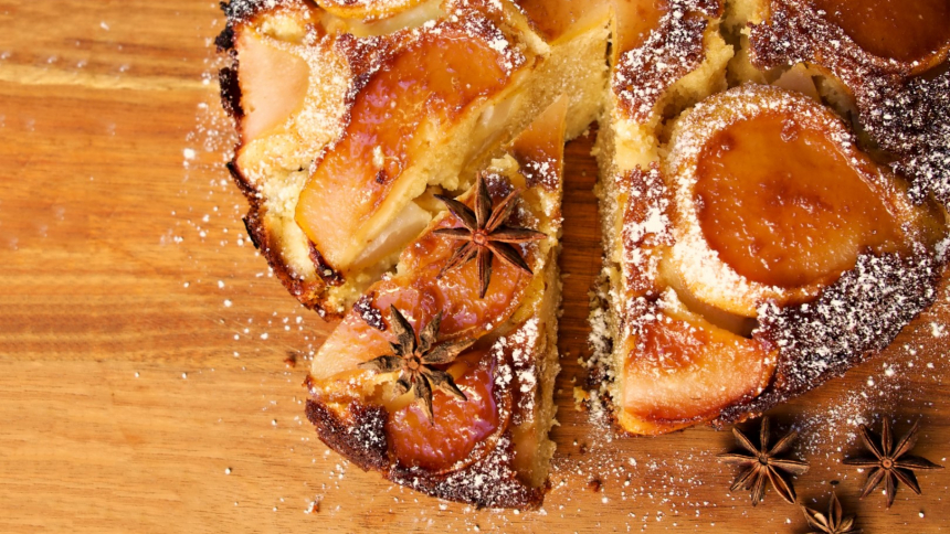 Pear,Upside,Down,Cake,With,Castor,Sugar,On,A,Wooden